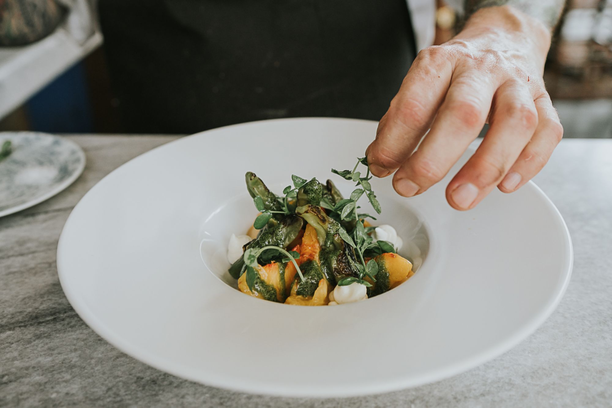 Enjoy White Oak's tasty peach salad while dining on Peachtree Street