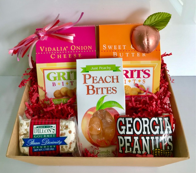 Gift basket filled with peach-themed snacks and treats, including cookies and candies in Atlanta, Georgia.