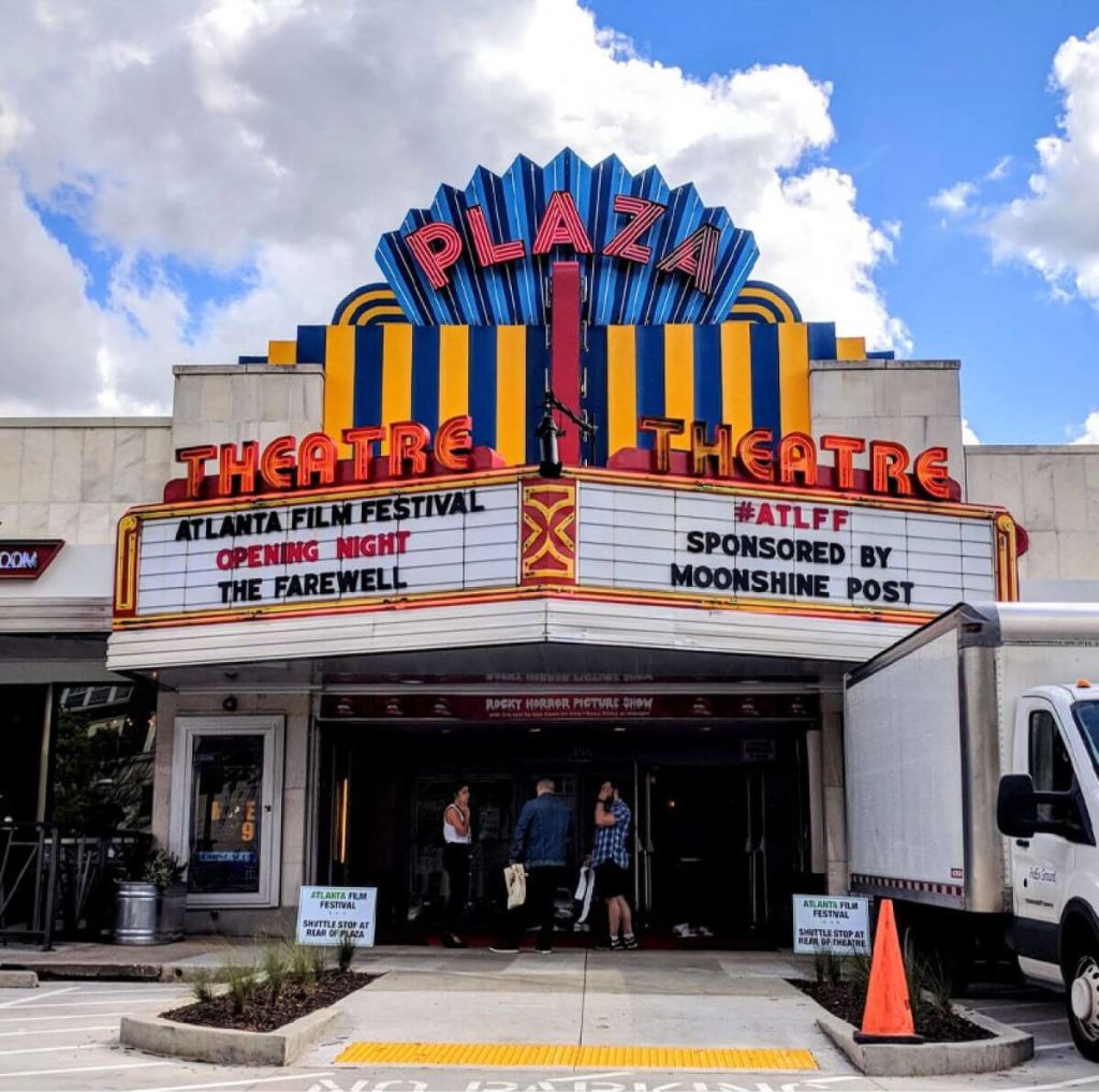 Art deco theater marquee advertises Atlanta Film Festival with 'Opening Night: The Farewell', sponsored by Moonshine Post in Atlanta, Georgia.
