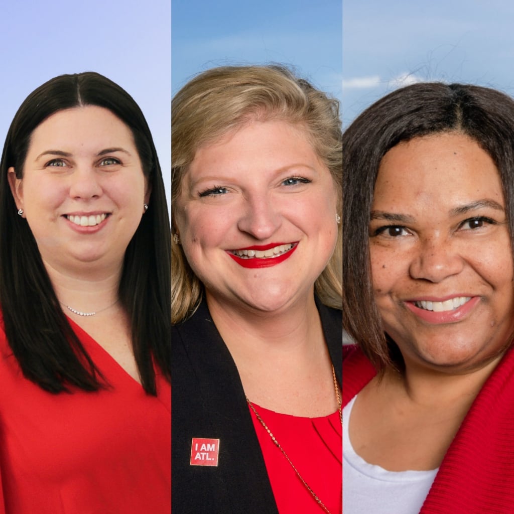 ACVB Hires New Sales Manager and Promotes Two Long-Time Employees 1 Three smiling women with different hair colors and styles, all wearing red in Atlanta, Georgia.