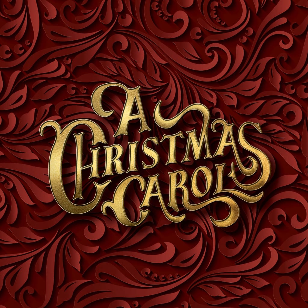 Gold script 'A Christmas Carol' on a red, swirling floral background in Atlanta, Georgia.