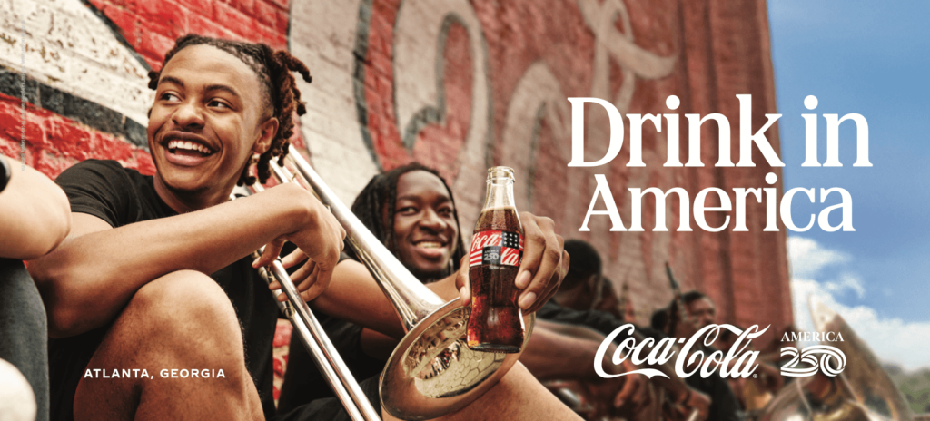 Young musicians enjoying Coca-Cola while playing brass instruments against a vibrant mural in Atlanta, Georgia in Atlanta, Georgia.