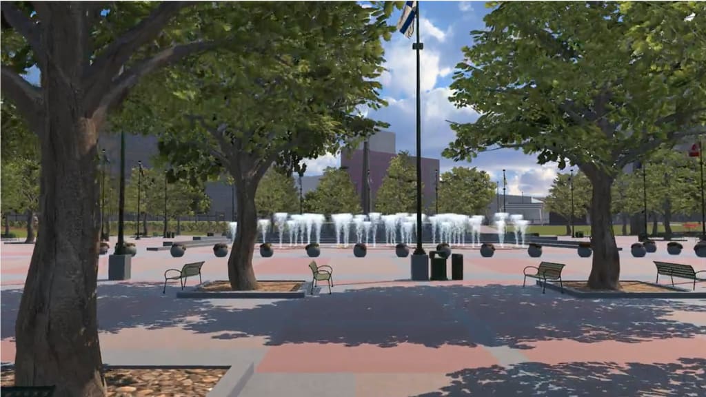 A serene park square features a central fountain surrounded by benches and lush trees in Atlanta, Georgia.
