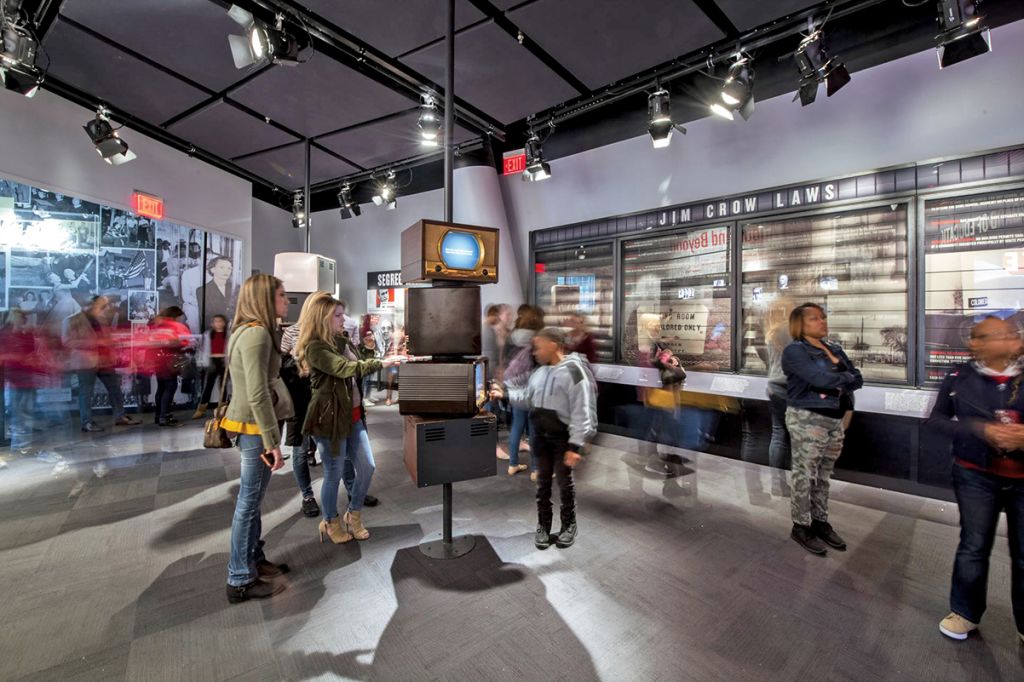 A view of people looking at the civil rights exhibits and learning about human rights at the National Center for Civil and Human Rights.