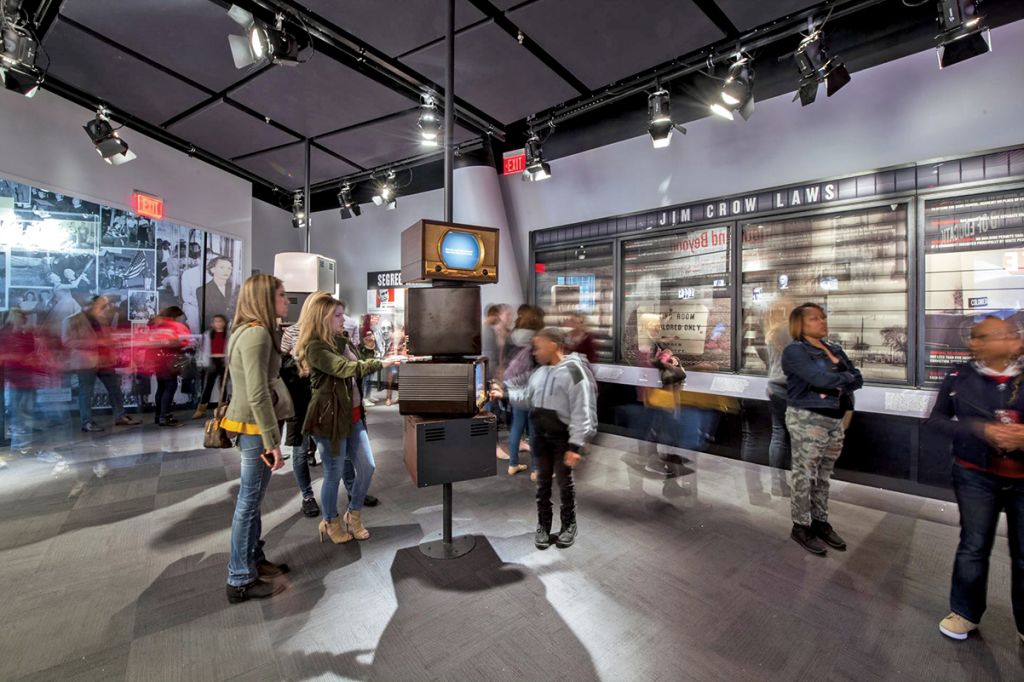 A view of people looking at the civil rights exhibits and learning about human rights at the National Center for Civil and Human Rights. 