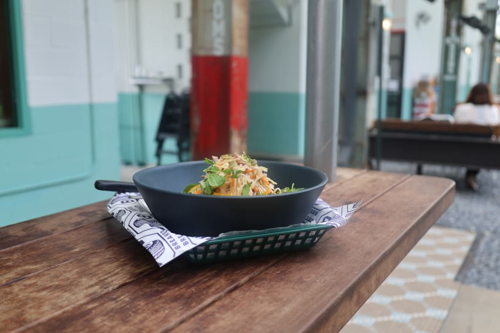 image of food from Breaker Breaker with views of the Atlanta Beltline.