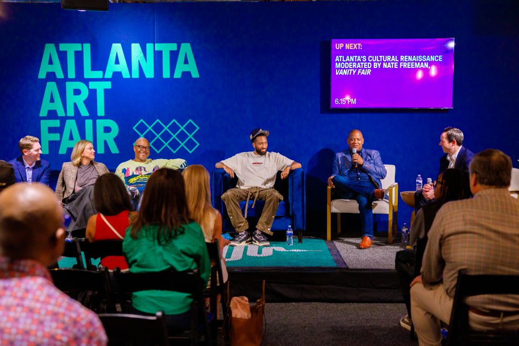 @DiscoverAtlanta Link In Bio 37 A panel discussion at the Atlanta Art Fair with six speakers and an audience in Atlanta, Georgia.