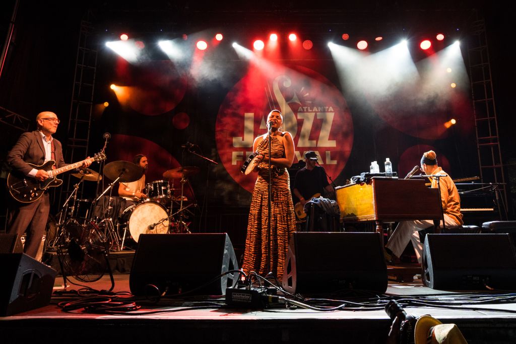 performer on stage of atlanta jazz festival piemdont park