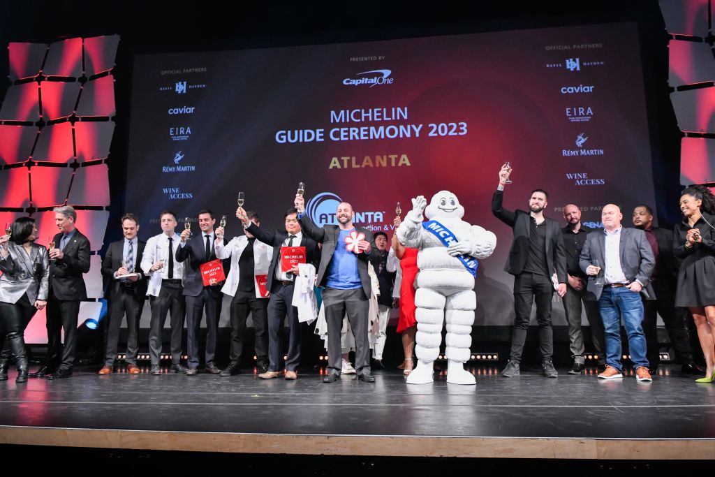 image of Mara Davis, Andrew Wilson, Marc Dezenski, J. Trent Harris, Ron Hsu, Aaron Phillips, Elisabeth Boucher-Anselin celebrate during Atlanta's MICHELIN Guide Ceremony 2023