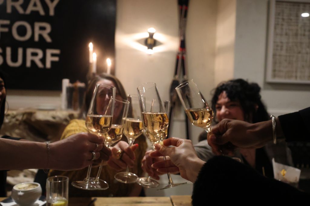 wine glasses cheersing