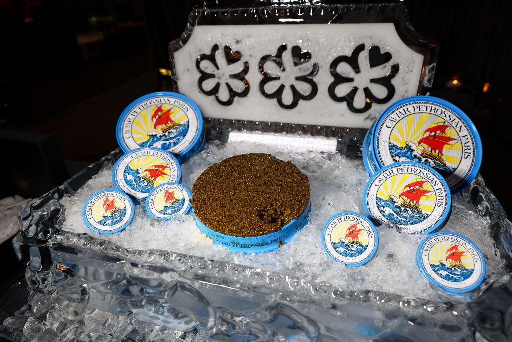 MICHELIN Guide Atlanta 2025 Awards 15 A display of caviar in a decorative ice sculpture with branded labels in Atlanta, Georgia.
