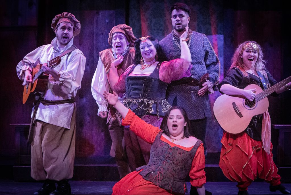 The cast singing and playing instruments at Shakespeare Tavern.