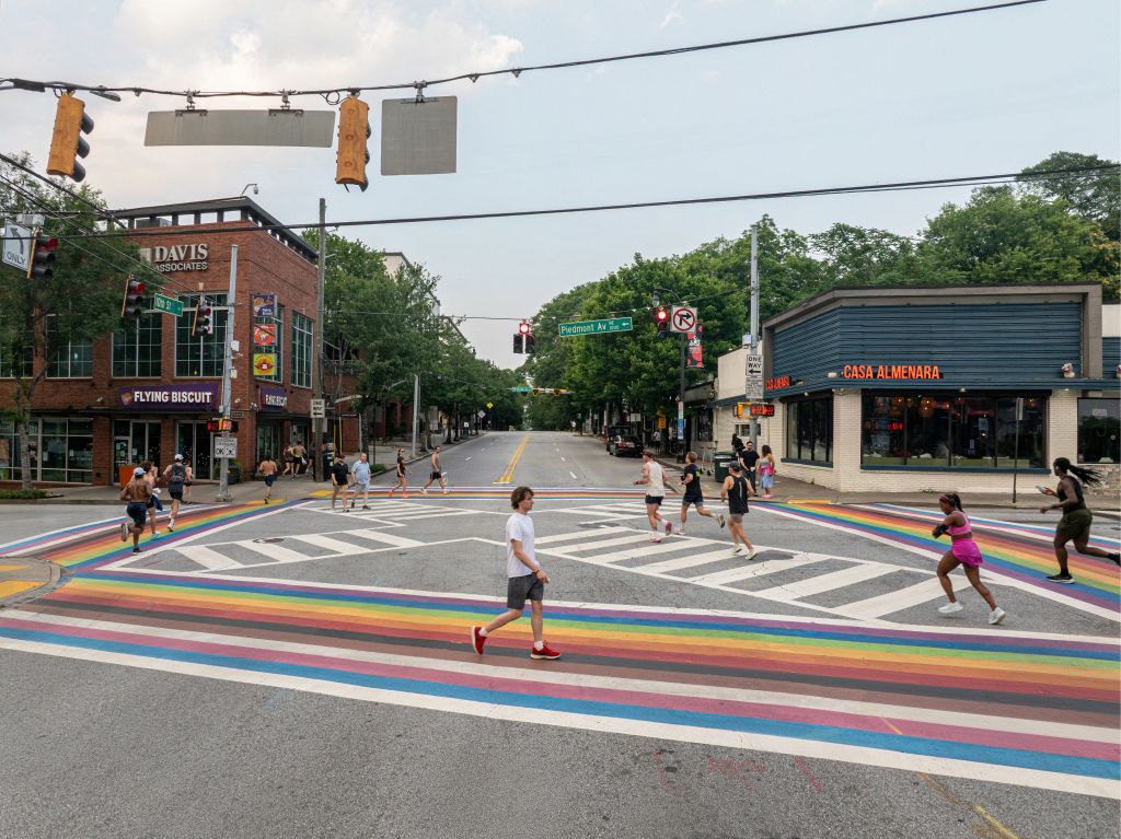 runners and walkers in Midtown Atlanta on the Rainbow Crosswalk