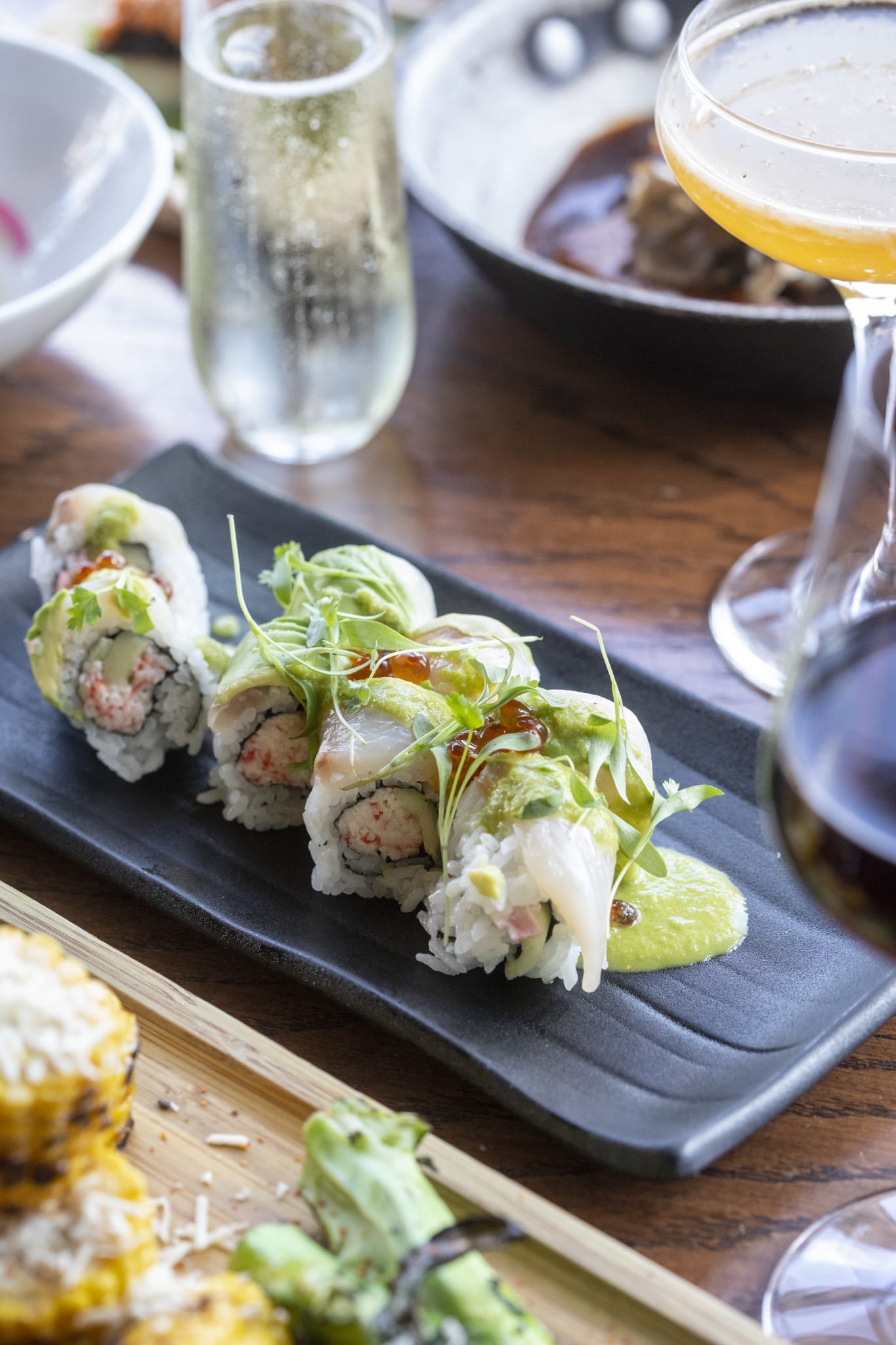 Enjoy specialty rolls and sashimi at O-Ku