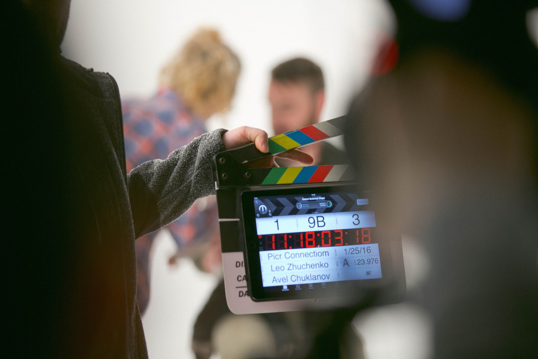 A film clapperboard with a digital display showing scene and take numbers in Atlanta, Georgia.