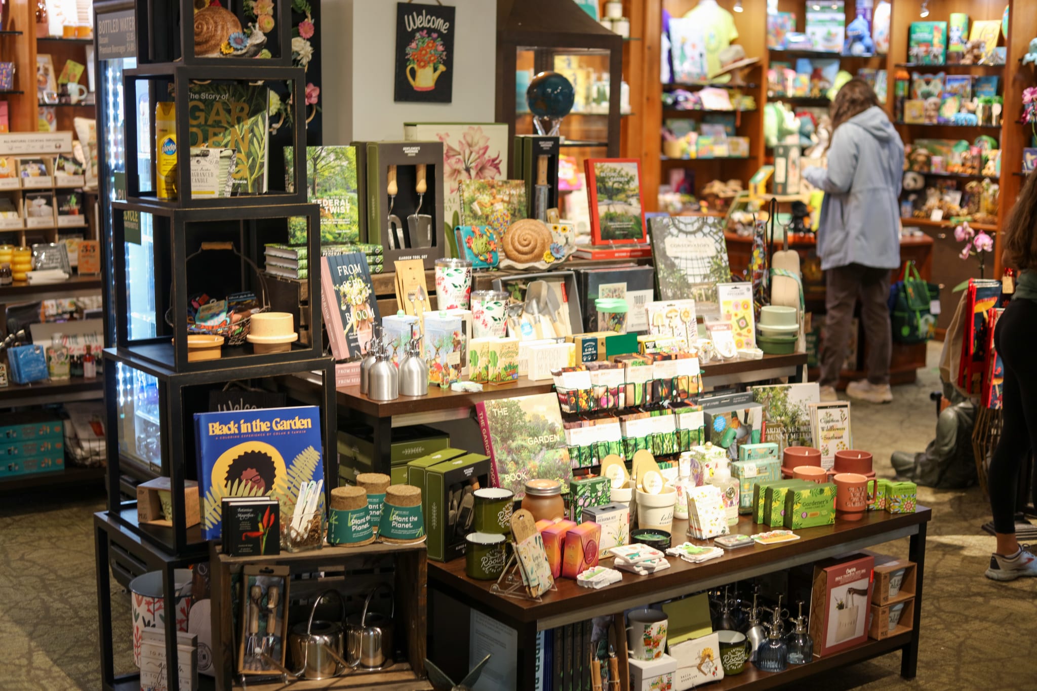 A vibrant garden center filled with colorful plants, gardening tools, and decorative items in Atlanta, Georgia.