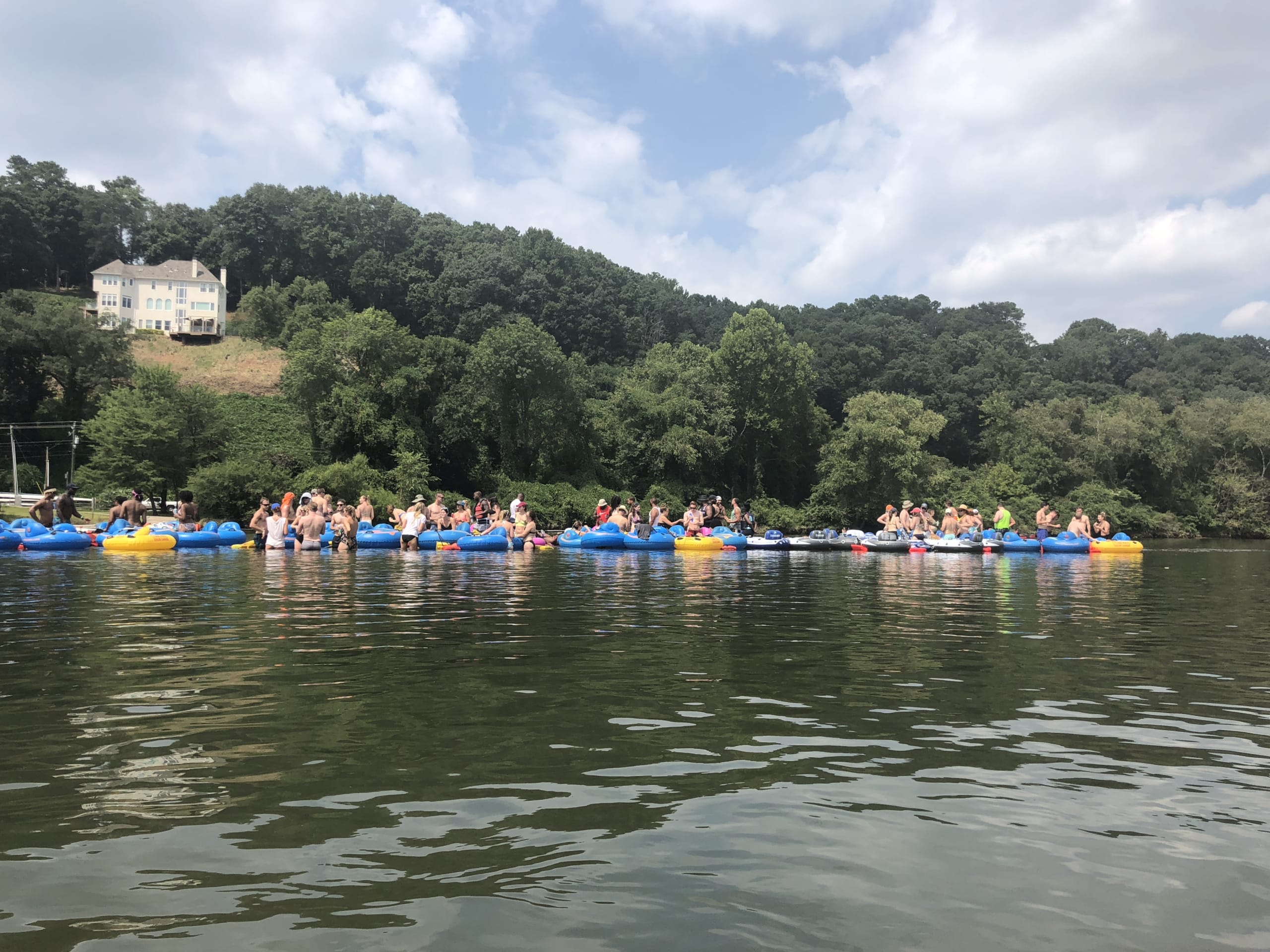 image of friends inter tubbing on the Chattahoochee River in atlanta ga.