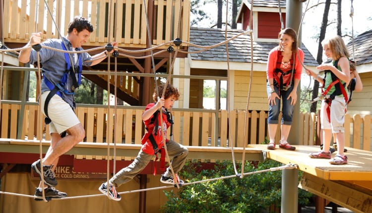 Family does high ropes course, Skyhike, at Stone Mountain