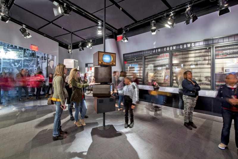 A view of people looking at the civil rights exhibits and learning about human rights at the National Center for Civil and Human Rights.