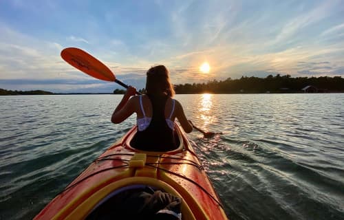 Kayaking into the sunset