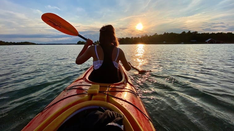 Kayaking into the sunset