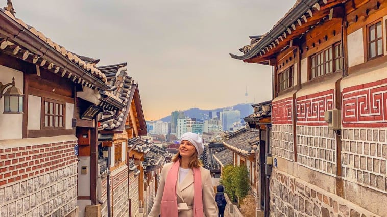 Bukchon Hanok Village with a beautiful view and Seoul Tower in the background.