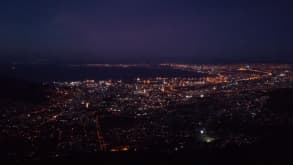 Cape Town - Exploring South Africas beach capital city - While in the cable car the city slowly started glowing