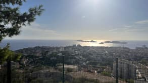 Marseille - Beach and nice City - View of Basilica of Notre-Dame of la Garde