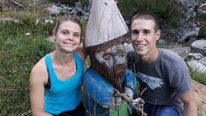 Piedmont - Italian food, history, and culture - Posing with one of many hand-carved statues outside Rifugio Levi Molinari