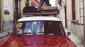 Havana - History, Salsa - Our driver from Habana to Vinales - luggage goes on top of the car