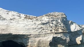 Milos - Breathtaking beaches and volcanic rock formations. - Exploring around island by boat.