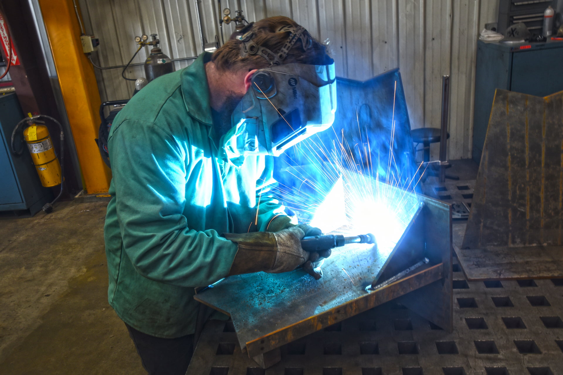 CNC Machine drilling holes in large metal block