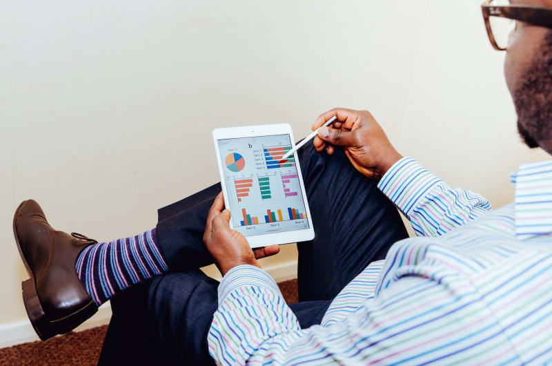 Man checking the progress of a digital marketing campaign