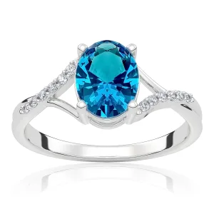 Pierścionek zaręczynowy z białego złota z topazem London Blue i brylantami Liane 1,25 ct