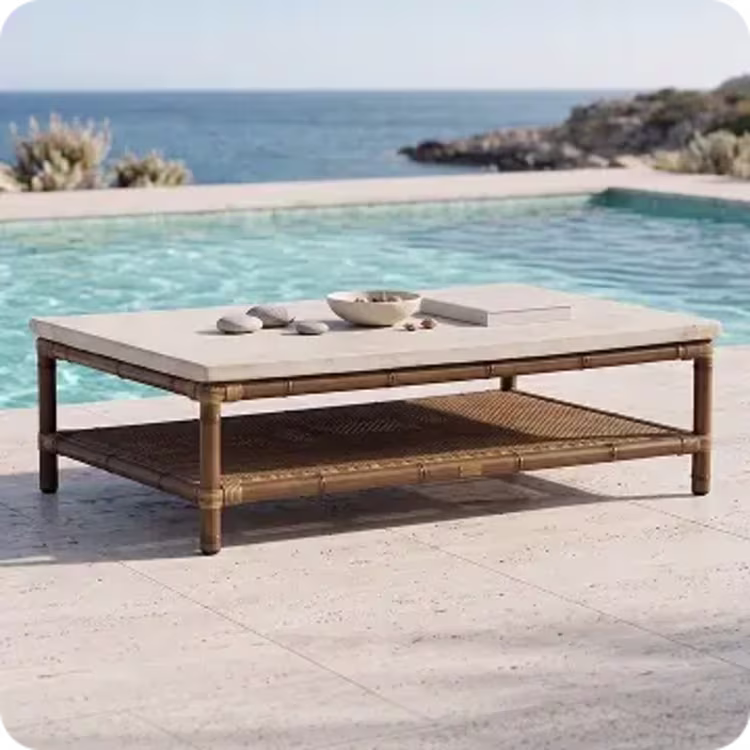 Rectangular bamboo coffee table poolside.