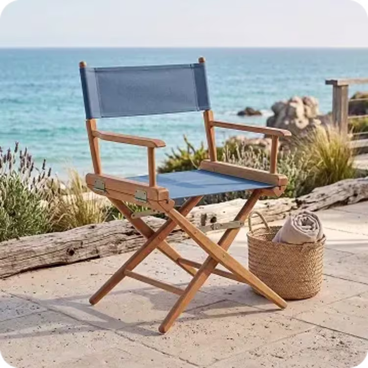 Blue folding wooden director's patio chair.