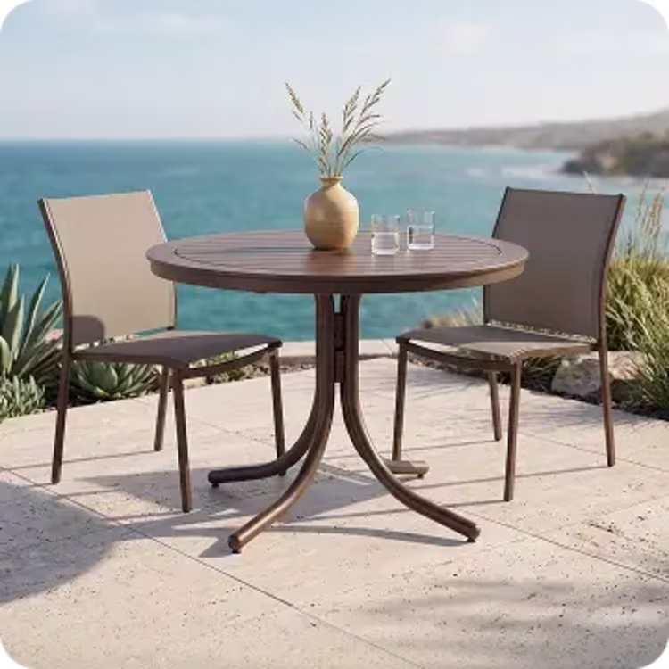 Round patio table with two chairs.