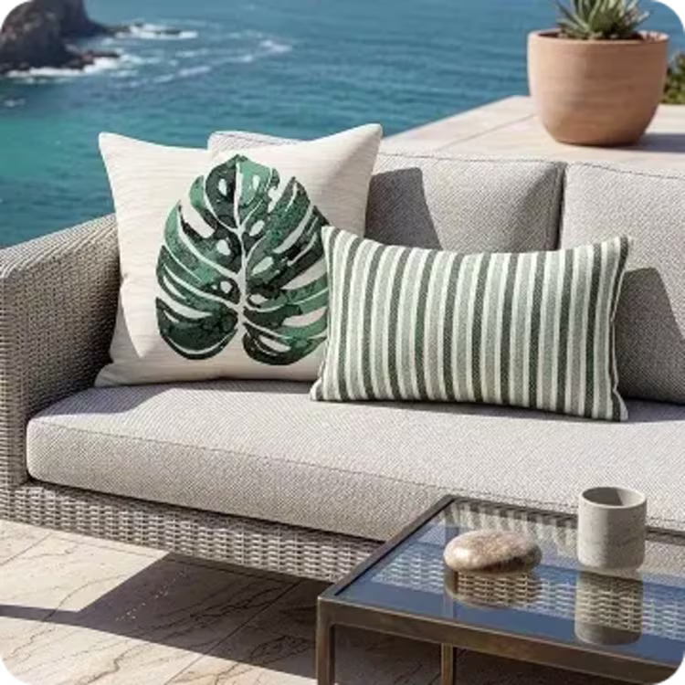 Patterned accent pillows on outdoor sofa.