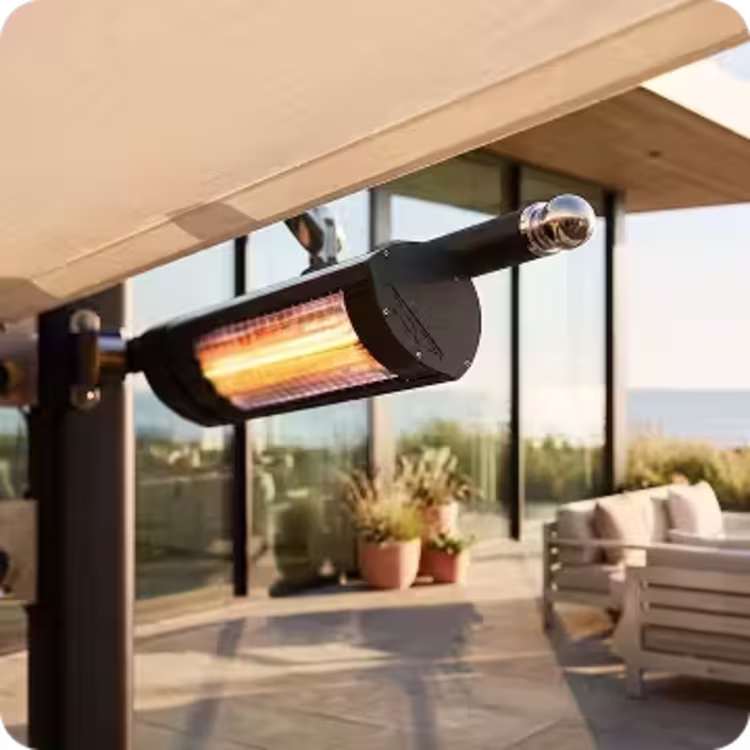 Close-up of a glowing patio heater mounted beneath an outdoor canopy.