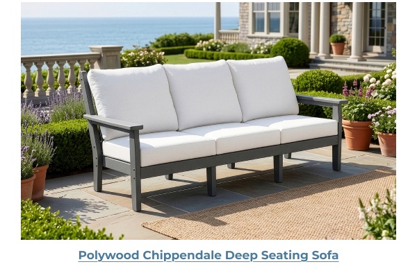 White outdoor sofa on stone patio. Image Text: Polywood Chippendale Deep Seating Sofa