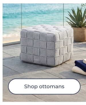 Woven grey outdoor ottoman pouf. Image Text: Shop ottomans