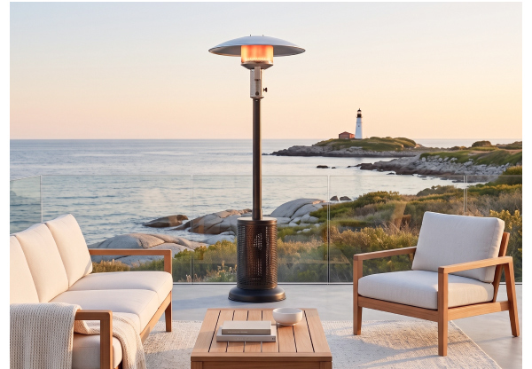 Sunglo portable propane patio heater on an oceanfront terrace at sunset