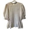 Smocked Peplum Top