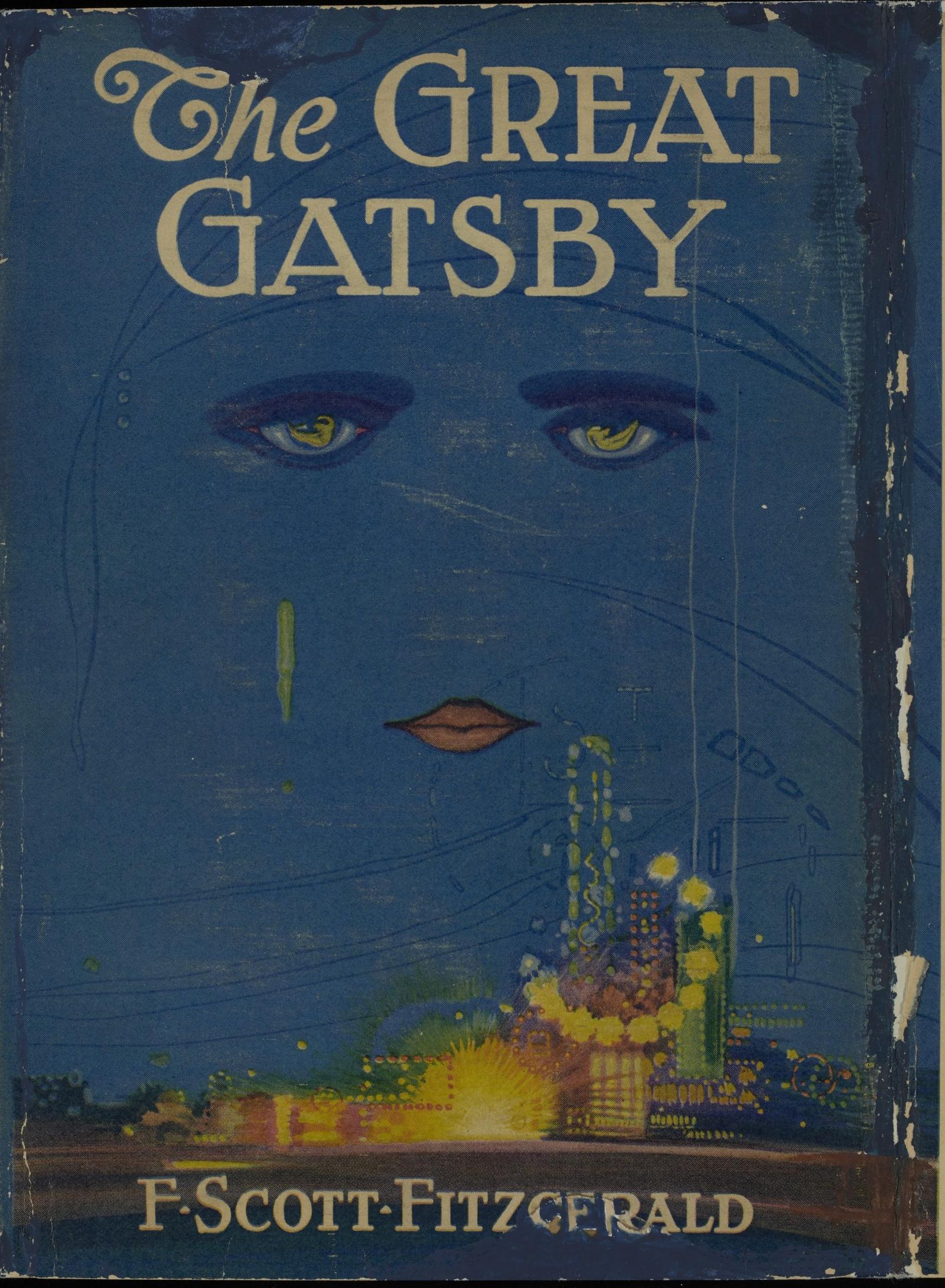 Front panel of the 1925 Gatsby jacket: floating eyes contain tiny reclining figures above a mouth, a green tear, and bright lights against a blue field. The paper shows wear and creases.