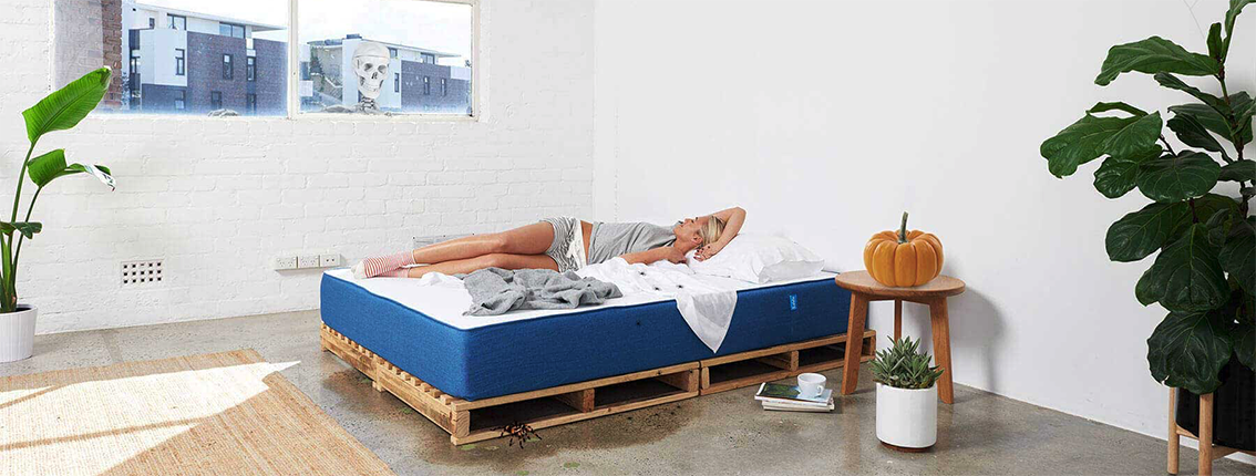 koala mattress halloween campaign featuring lady sleeping on bed