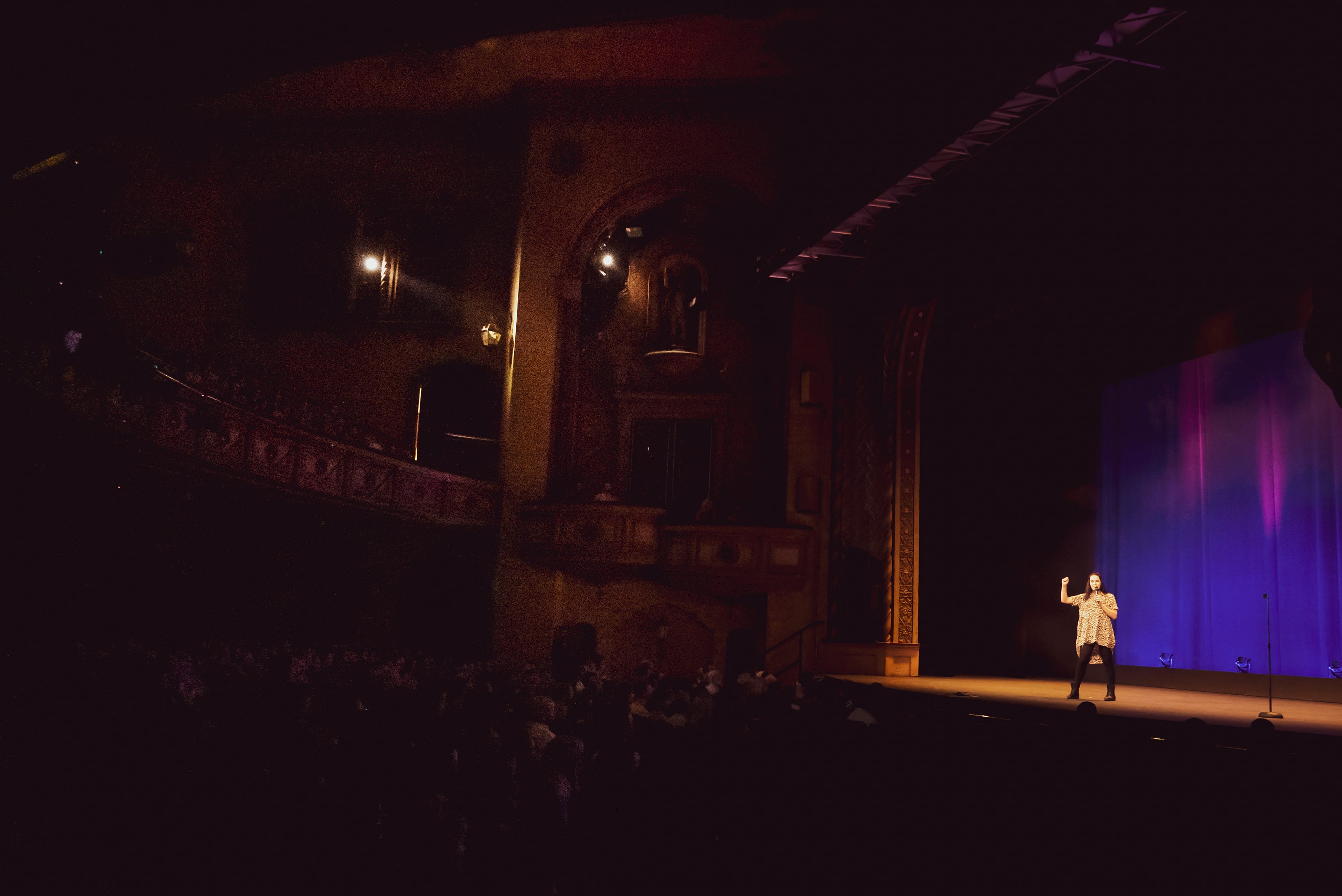 comedian on civic theatre stage at newcastle comedy festival
