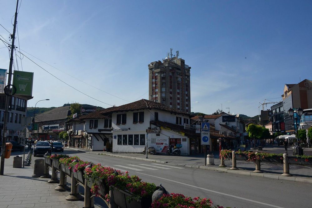A street in central Novi Pazar with pedestrians and urban buildings