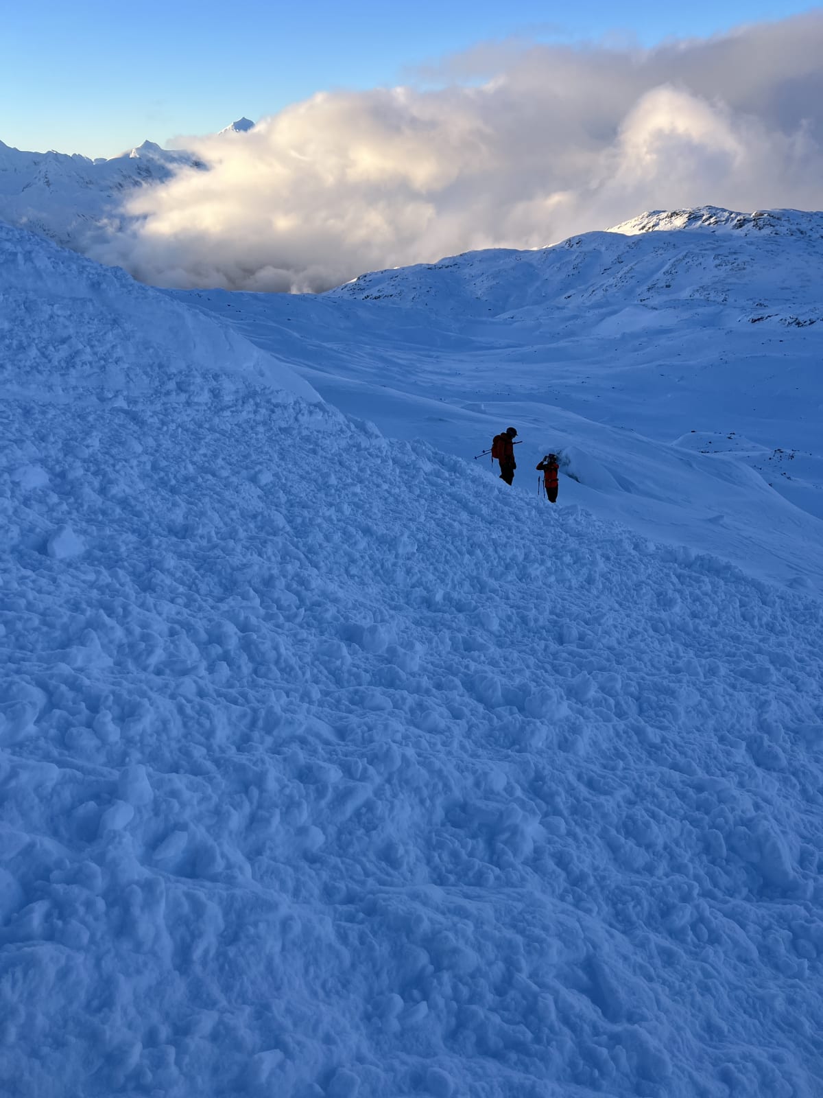 wide debris pile, less than a meter thick and soft to ski down