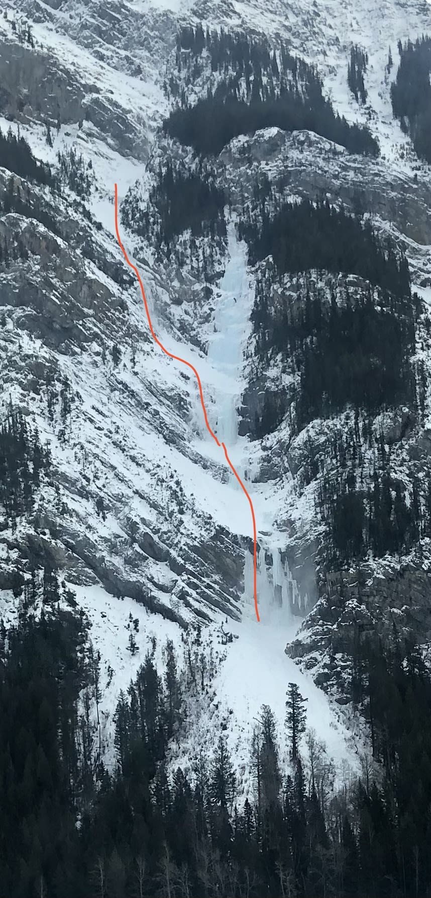 Sluff originated in alpine and followed red line down entraining more snow on the way and running over top of climb. Only caught the remnants of sluff in the photo.