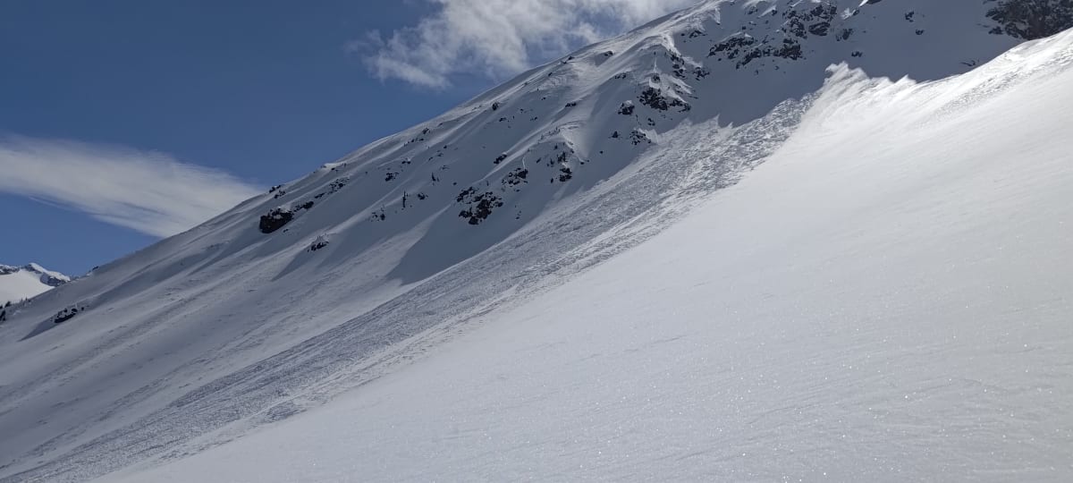 One decent size dry slide coming off the top, either from rocks or a cornice 